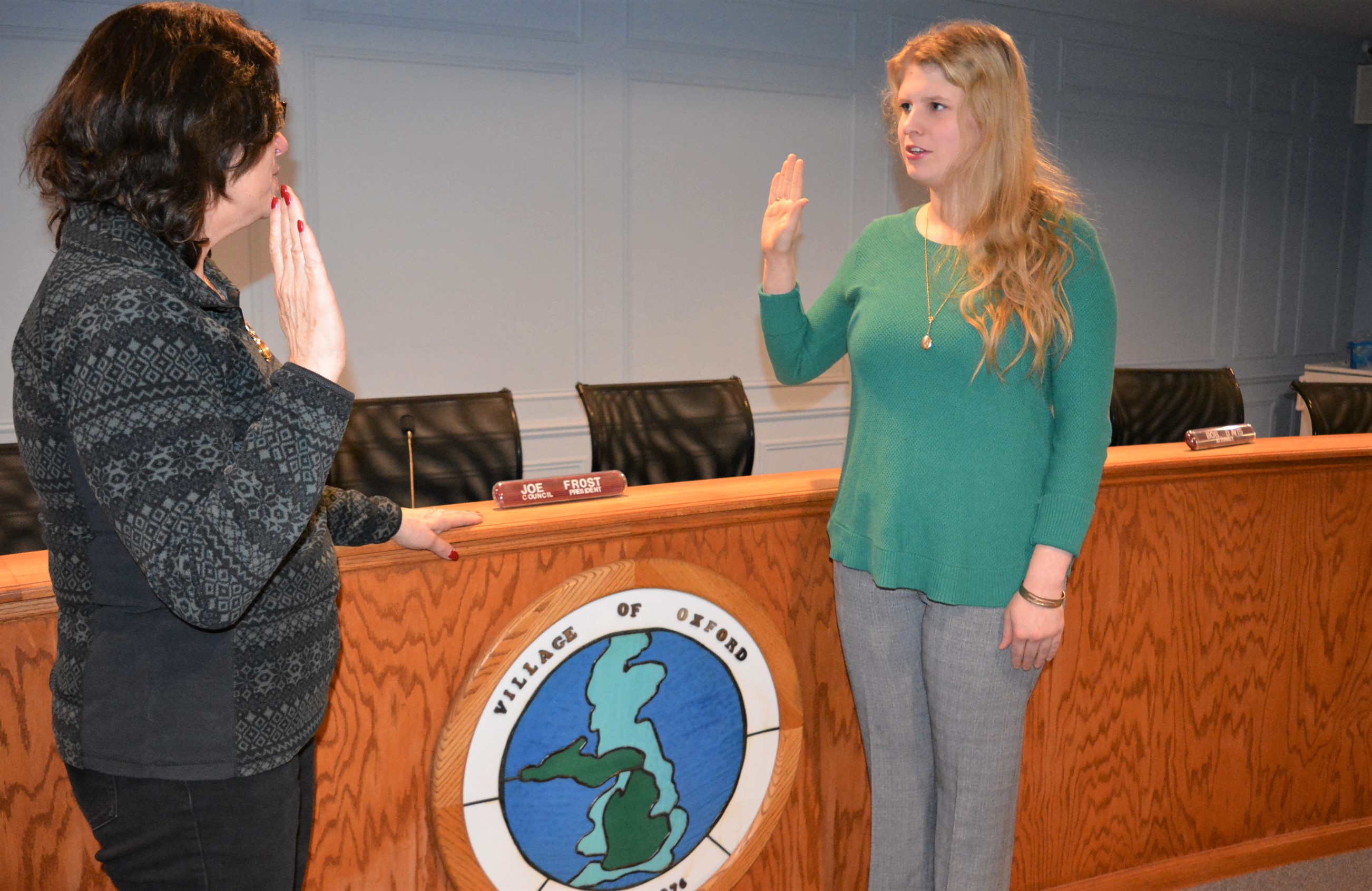 New Oxford Village Councilwoman Allison Kemp (right), 26, was sworn into office on Jan. 10 by Clerk Teresa Onica. Photo by C.J. Carnacchio.