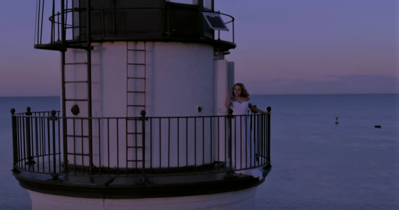 In the video, Paige Elizabeth Parent, a 2017 OHS grad, sings "Come to the Light, the Storm of 1913" from the top of the historical Fort Gratiot Lighthouse in Port Huron. Photo provided. 