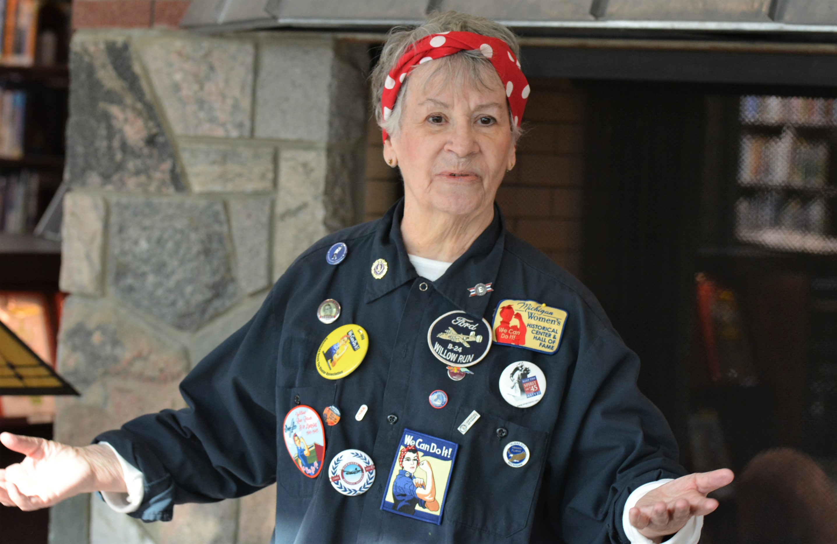 Dressed as the World War II cultural icon that symbolized working women, Donnaleen Lanktree, president of the American Rosie the Riveter Association, speaks during a fireside chat held Friday at the Oxford Public Library. Photo by C.J. Carnacchio.