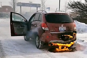 Orion Twp. resident Aaron Gard didn’t know his 2008 Saturn Vue was on fire on Jan. 30 until an LOPD officer stopped him at the Chase Bank in Oxford Twp. to get him out of the vehicle. Photo provided by Lake Orion Police.