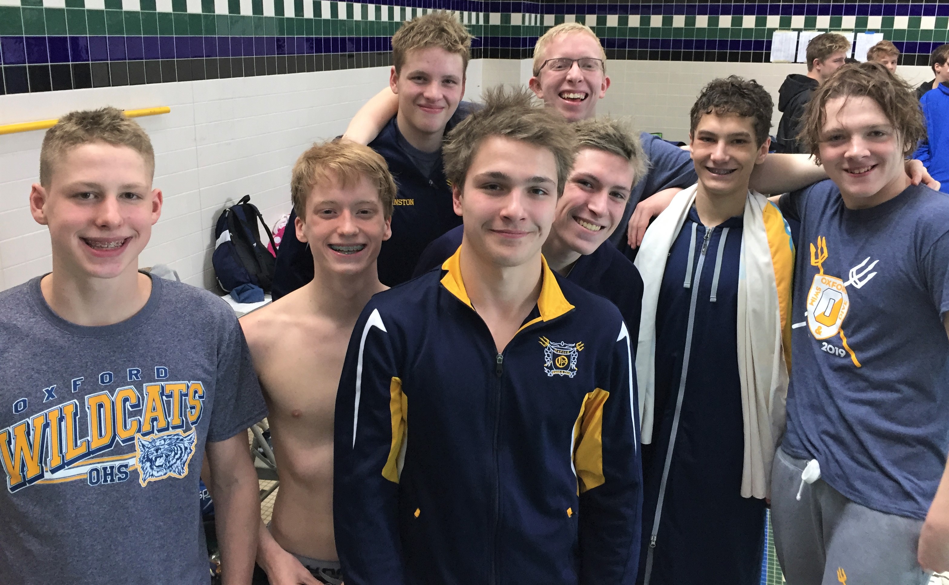 Oxford swimmers pose after their performance at the Oakland County meet. In the back is Nathanial Johnston and Ethan Matteson. In the front, from left, is Carson Wolf, Cole Bukoski, Carter Pollard, Alex Olheiser, Ben Datsko and Zach Beatty. Photo provided. 