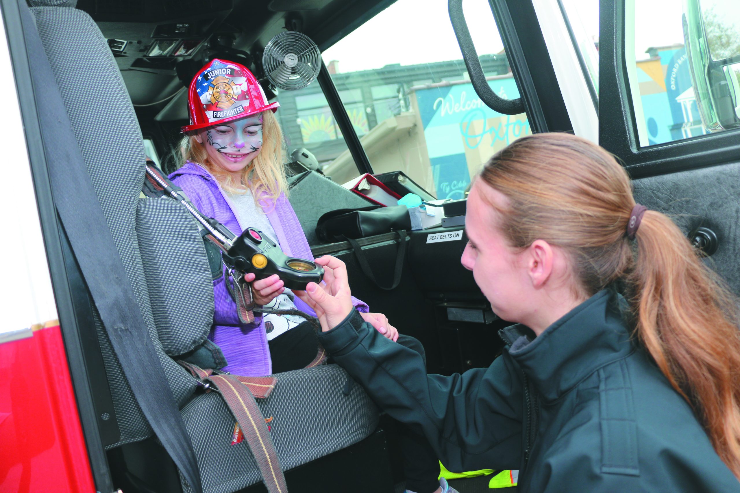 Ryleigh Hayes with Oxford Firefighter Rachel Albrecht