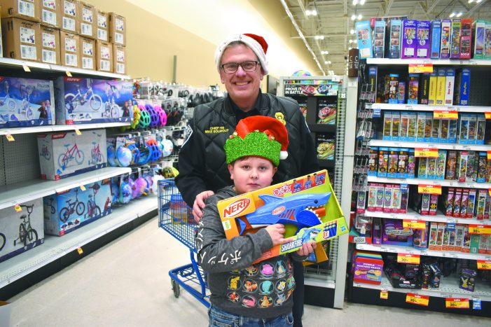 Oxford first responders radiate the Christmas spirit during Shop with a Hero